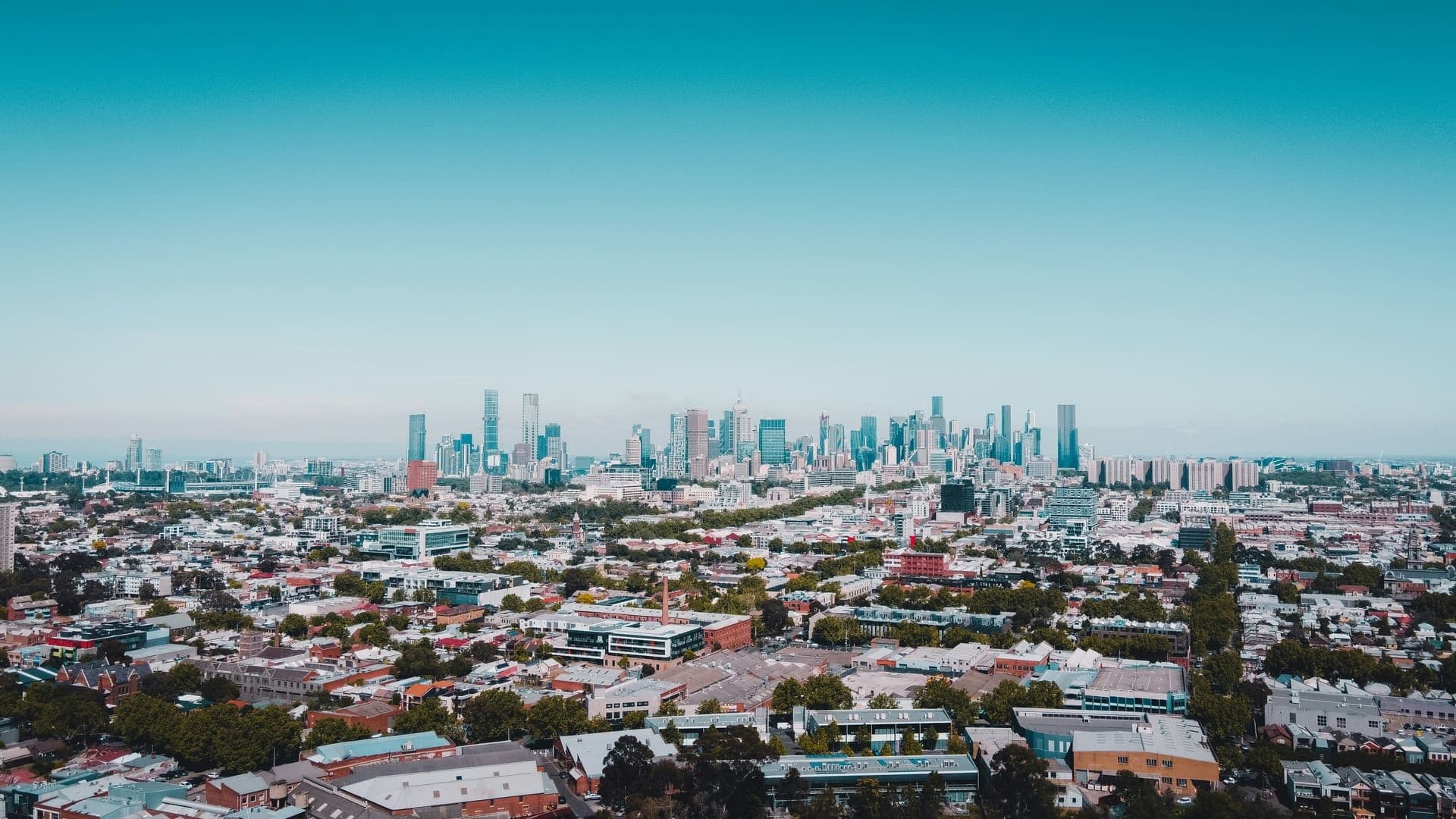 Melbourne city skyline rising beyond the eastern suburbs